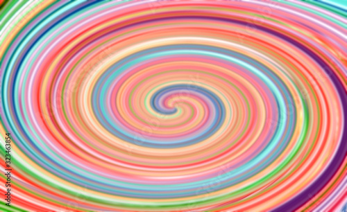 Blurred abstract spiral varicolored background rainbow tone with copy space for text or image.