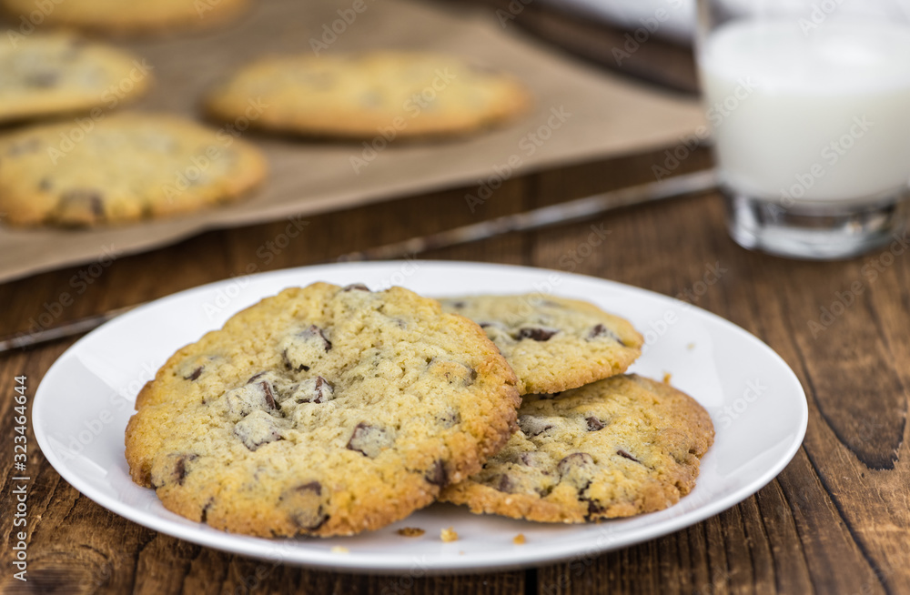 Chocolate Chip Cookies (fresh made) as detailed close-up shot; selective focus Chocolate Chip Cookies (fresh made) as detailed close-up shot; selective focus