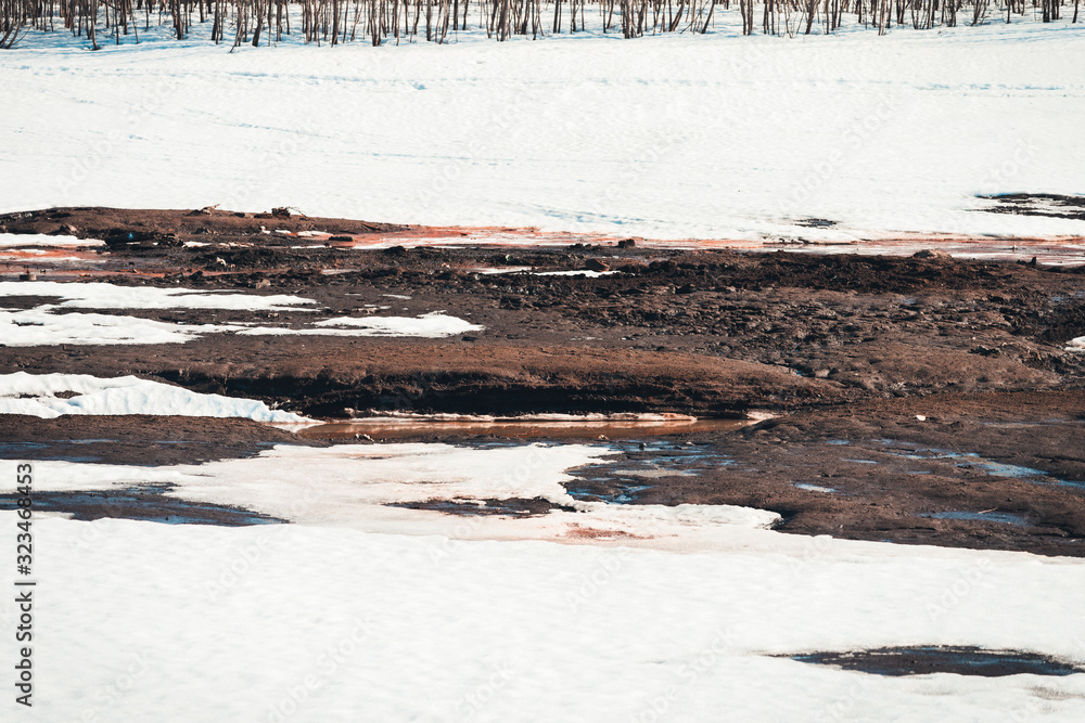 Melting white snow from the warmth of spring days. Melting white snow from the warmth of spring days.