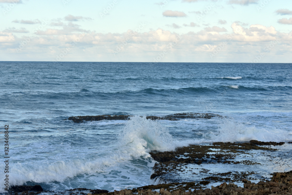 waves crashing on rocks