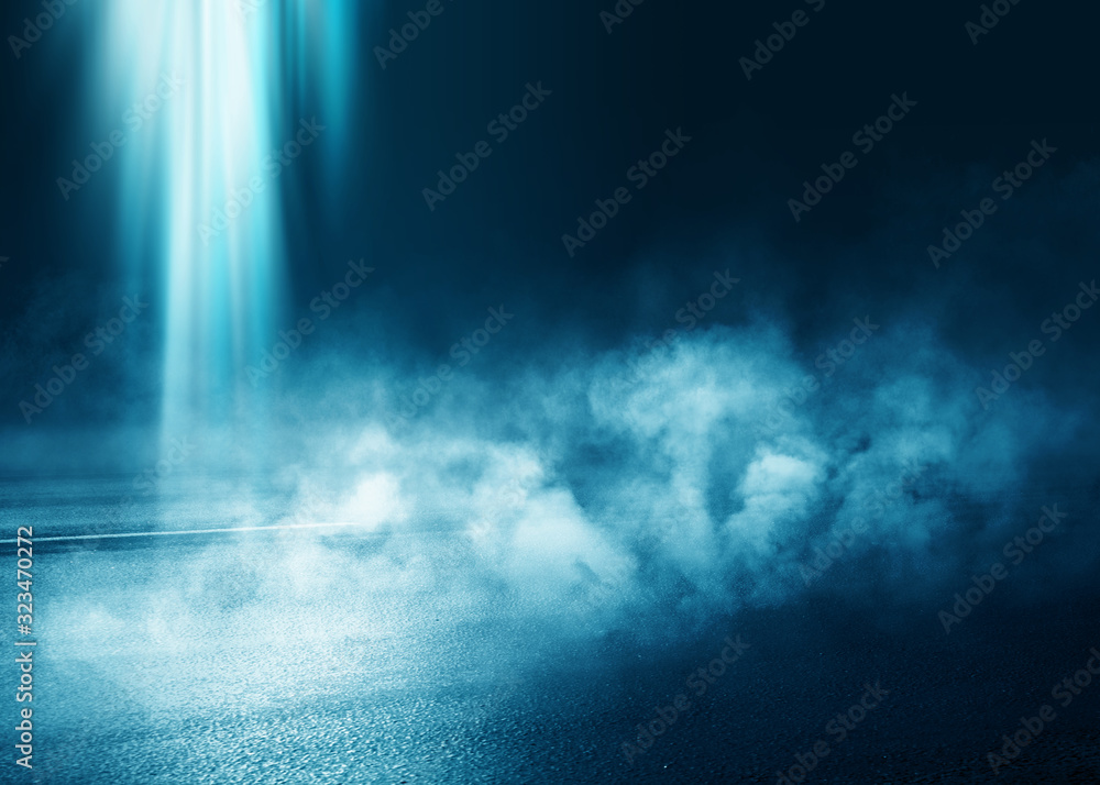Dark blue abstract futuristic background. Laser neon rays. Neon light, reflection on the asphalt, smoke, smog