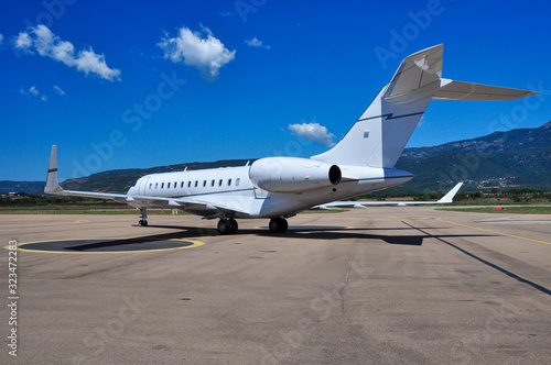 Beautiful private business jet Gulfstream G5 on the tarmac of Figari airport. Super rich lifestyle during summertime.