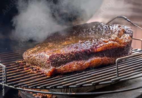 Photography Fresh smoked Texas bbq brisket on the grill