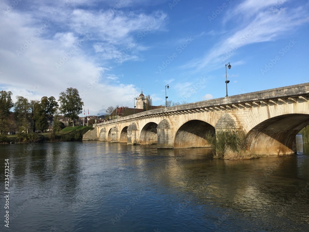 The Grand-Pont de Dole bridge and the Doubs river in Dole, France.