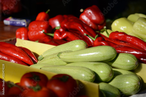 Food background with assortment of fresh organic vegetables at market