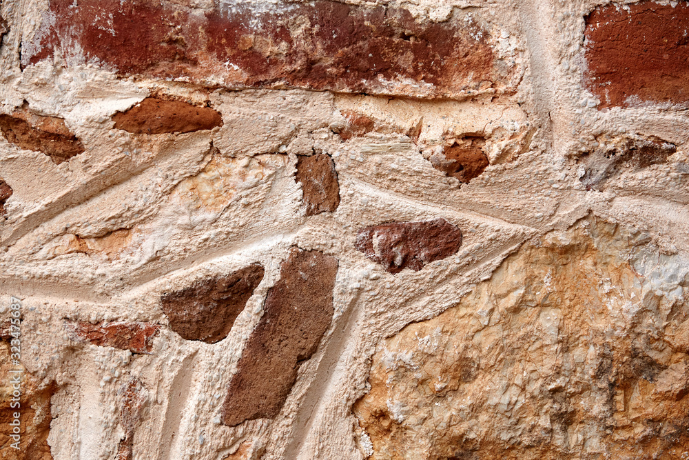 Obraz premium Background of an old stone wall of brown color