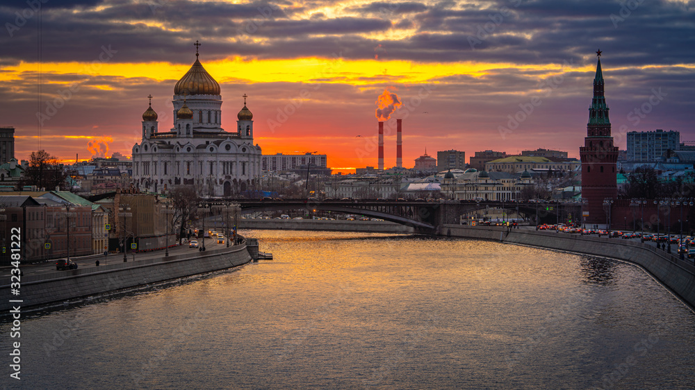 Fototapeta premium Beautiful wide angle view of the city of Moscow with Moscow River and Chris the Savior Cathedral at sunset. Travel destination Moscow, Russia