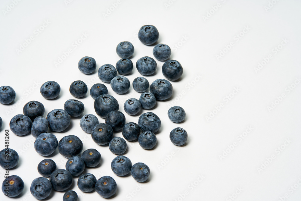 Tasty blueberries isolated on white background. Blueberries are antioxidant organic superfood. Tasty blueberries close up. Tasty blueberries isolated on white background. Blueberries are antioxidant organic superfood. Tasty blueberries close up.