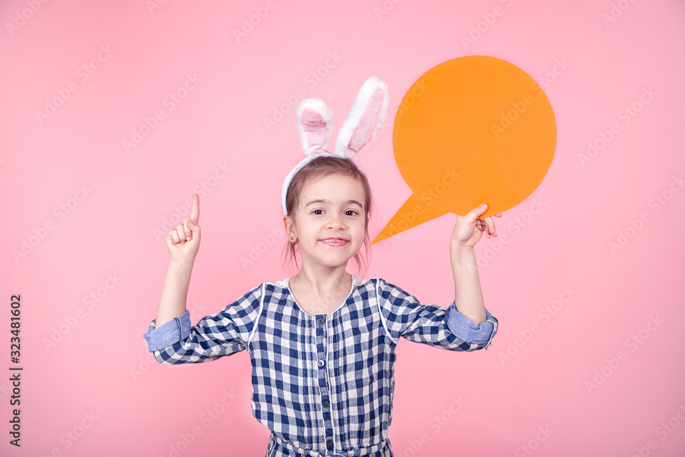Easter portrait of a cute little girl with space for text.