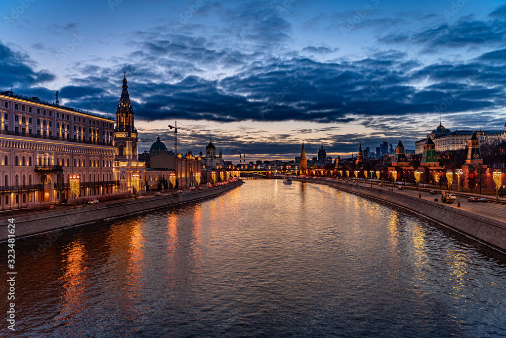 Fototapeta premium Wide angle view of the city of Moscow with Moscow River and Chris the Savior Cathedral at sunset. Travel destination Moscow, Russia