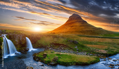 Scenic image of Iceland. Incredible Nature scenery during sunset. Great view on famous Mount Kirkjufell with Colorful, dramatic sky. popular plase for photografers. Best famous travel locations © jenyateua