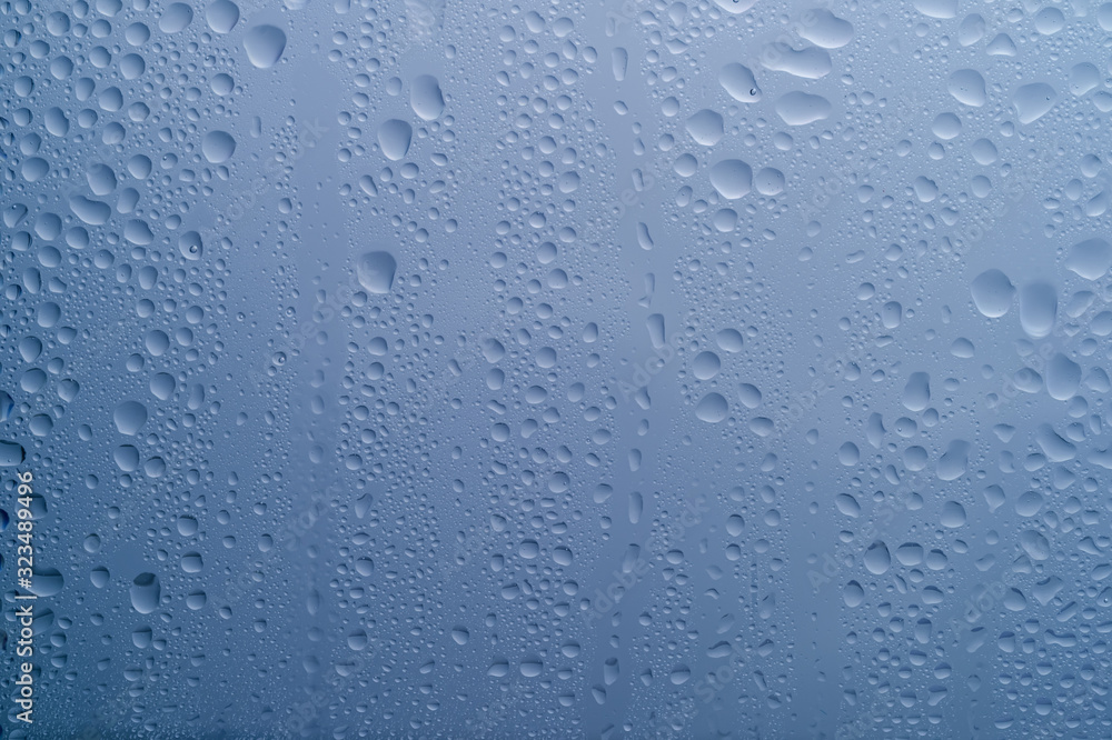  water drops on glass on a blue background2