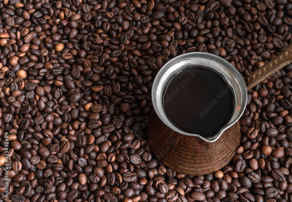 background of roasted coffee beans with turk background of roasted coffee beans with turk