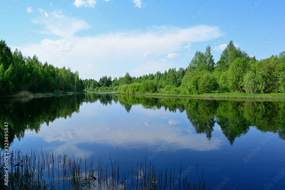Awesome landscape with river and blue sky with clouds