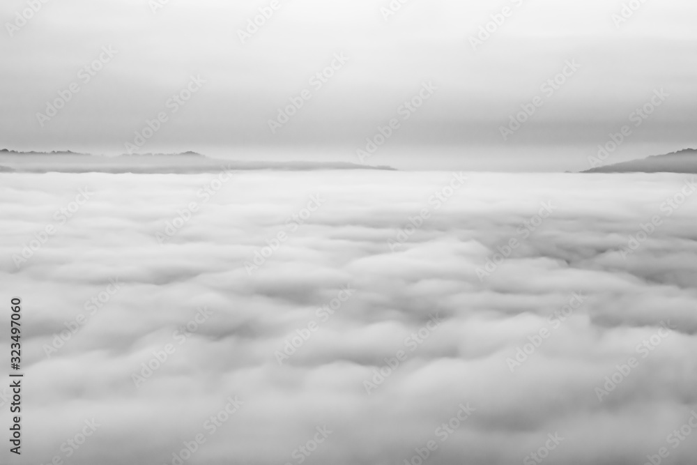 Grayscale shot of foggy in the morning at Phetchabun Thailand