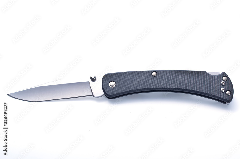 Folding pocket knife on a white background. Folding pocket knife on a white background.
