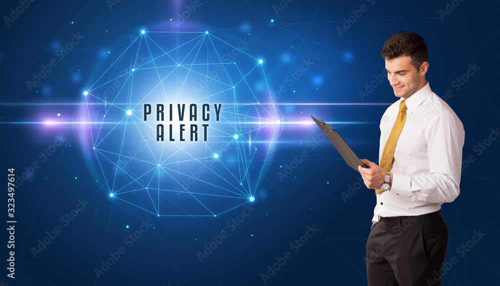 Businessman thinking about security solutions with PRIVACY ALERT inscription Businessman thinking about security solutions with PRIVACY ALERT inscription