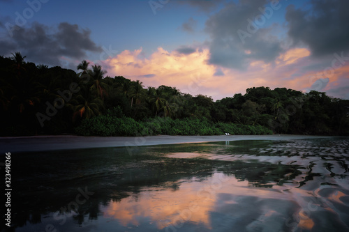 Beach sunset on Isla Palenque in Boca Chica, Panama
