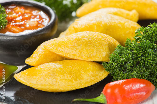 Empanadas with hot sauce, traditional Colombian food
