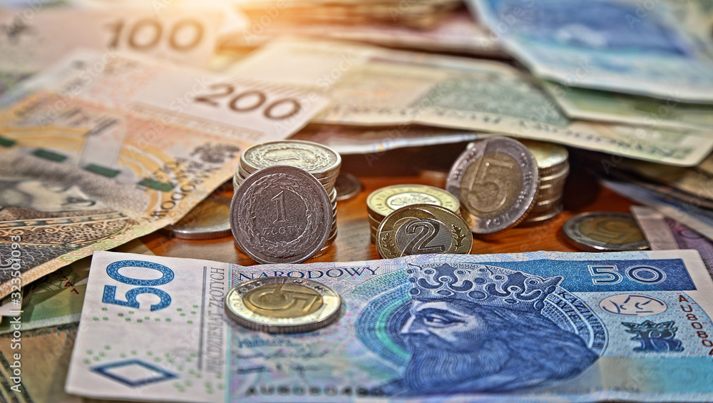 Polish money currency lying on the table Polish money currency lying on the table