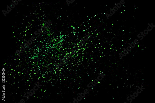 Green splashes isolated on black background