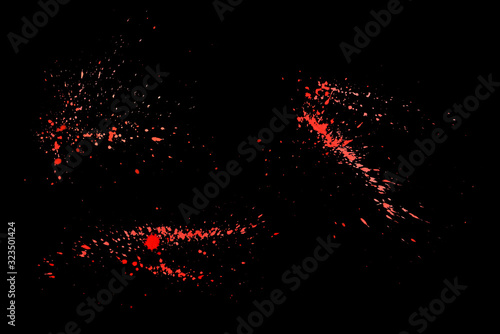 Red splashes isolated on black background