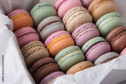 Colorful macaroons of pastel colors in the box