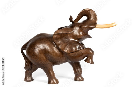 wooden figure of a elephant isolated on background.