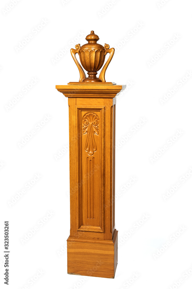 Wooden carved column with decoration upstairs on isolated background Wooden carved column with decoration upstairs on isolated background