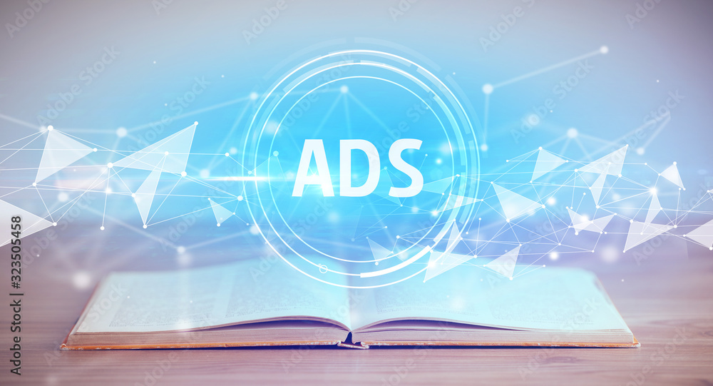 Fototapeta premium Open book with ADS abbreviation, modern technology concept