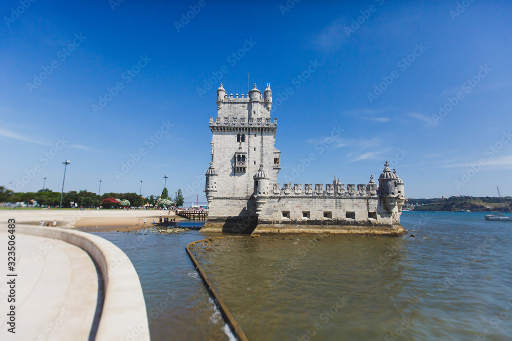 View of Belem district, civil parish of the municipality of Lisbon, Portugal, with Belem Tower, Torre de Belem in Portuguese, a prominent example of the Portuguese Manueline style