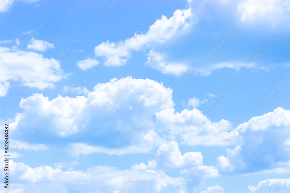 Blue sky with white clouds, cloudscape idyllic clear cloudy sky with cumulus clouds.