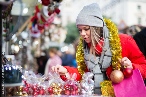 Girl shopping Christmas decorations