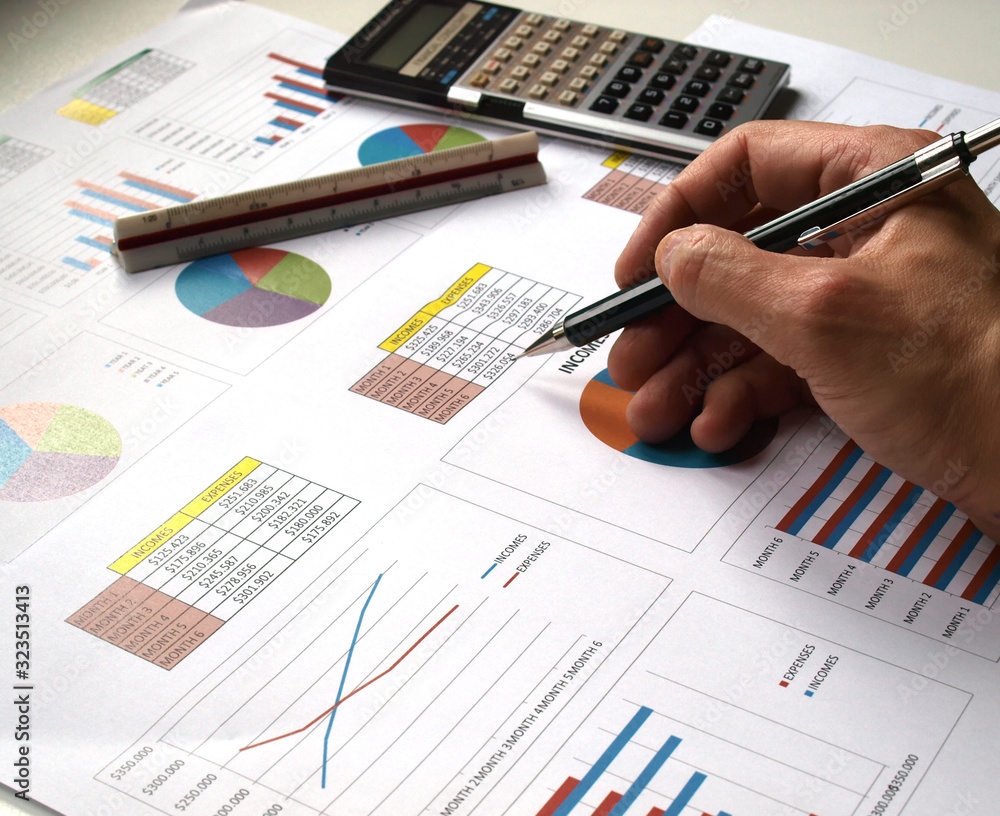 businessman working on financial charts, business strategy as concept businessman working on financial charts, business strategy as concept