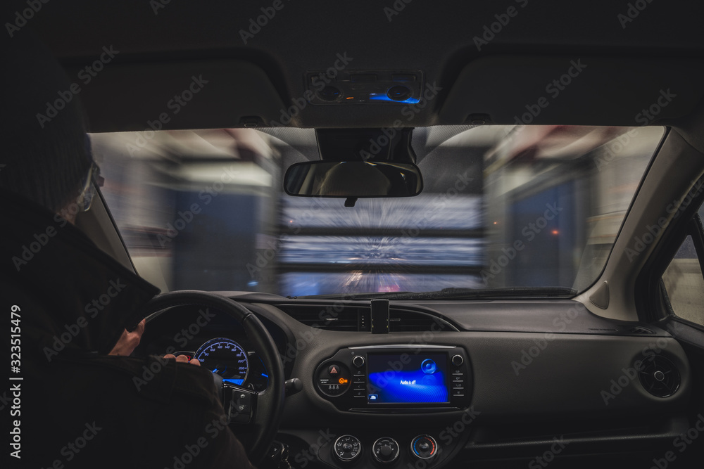 Interior of the car with motion outside on long exposure