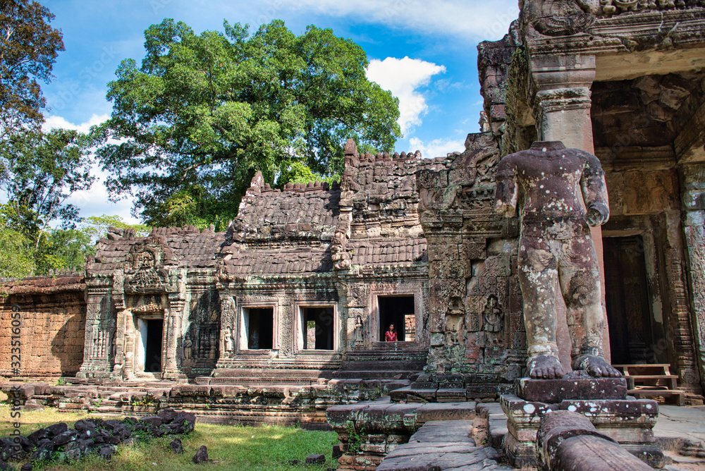 Naklejka premium Preah Khan Temple site among the ancient ruins of Angkor Wat Hindu temple complex in Cambodia