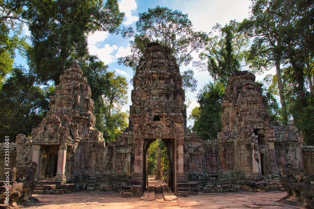 Naklejka premium Preah Khan Temple site among the ancient ruins of Angkor Wat Hindu temple complex in Cambodia