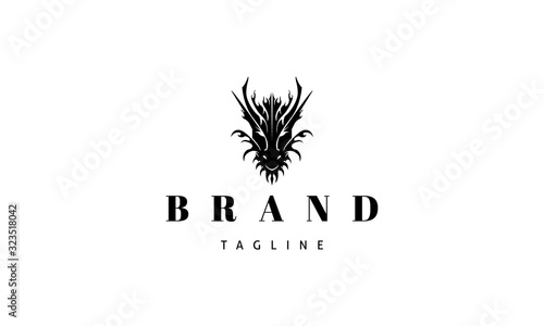 Vector logo on which an abstract image of a dragon head.
