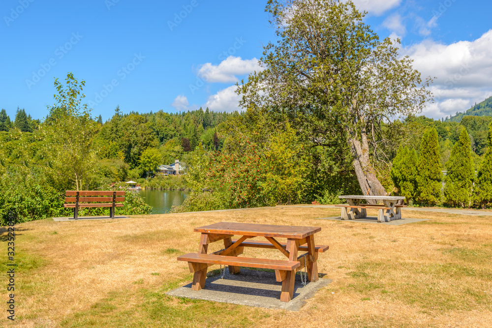Picnic table over mountains and blue sky. Picnic table over mountains and blue sky.
