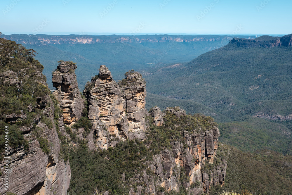 A view of the Three Sisters from Echo Point, Blue Mountains National Park, NSW, Australia taken during the mid day sun.