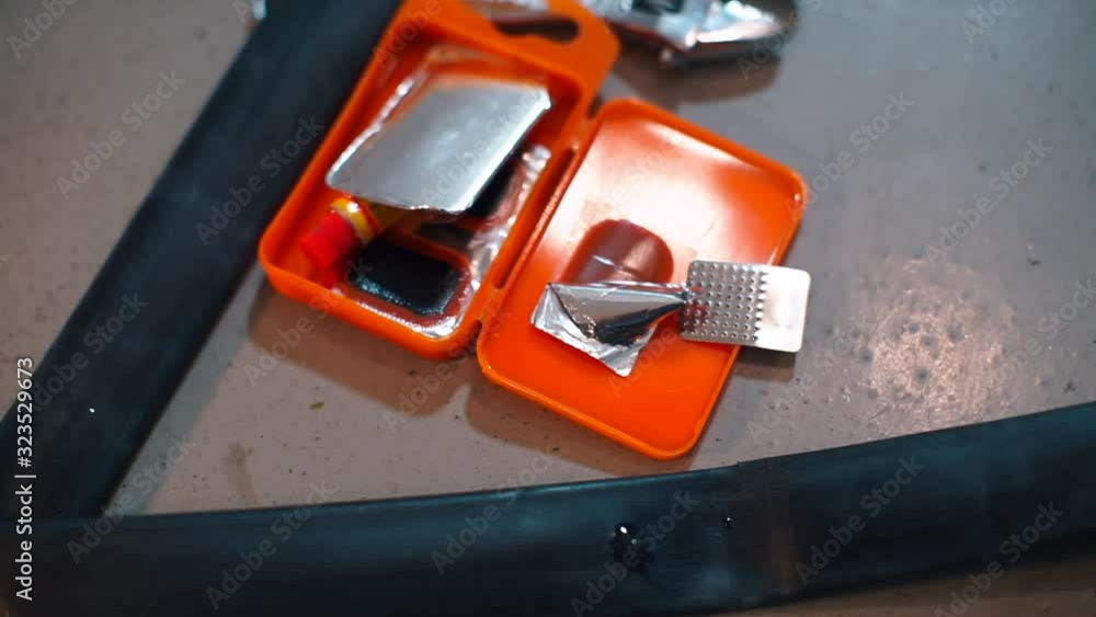 Close-up of a bicycle wheel seal kit on the road.