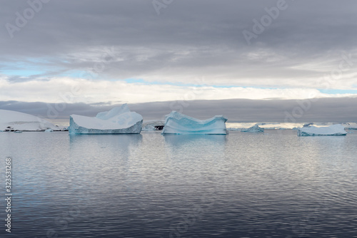 Antarctic landscape with iceberg, view from expedition ship © Alexey Seafarer