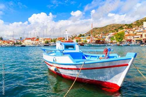 Typical colourful fishing boat in Pythagorion port, Samos island, Aegean Sea, Greece