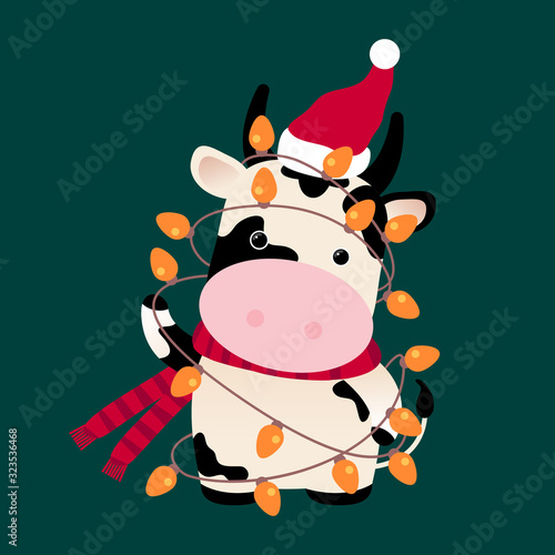 Ox with holiday tiny lights, Santa hat. Chinese Horoscope 2021 (Year of the White Metal Ox). Chinese New year symbol of 2021. Cute cow