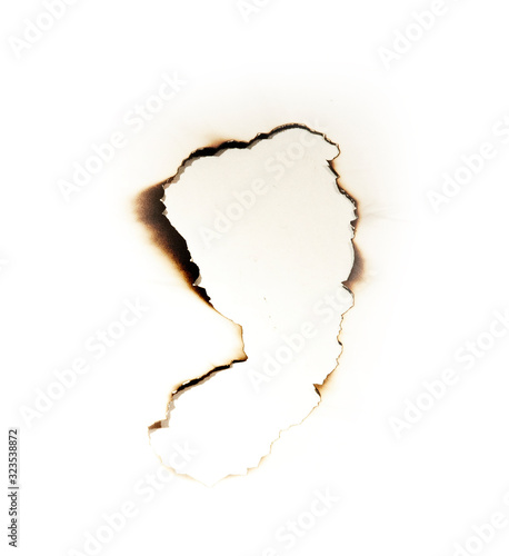 hole in paper burned with fire