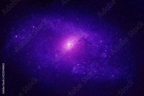 A blue galaxy in deep space. Elements of this image were furnished by NASA.