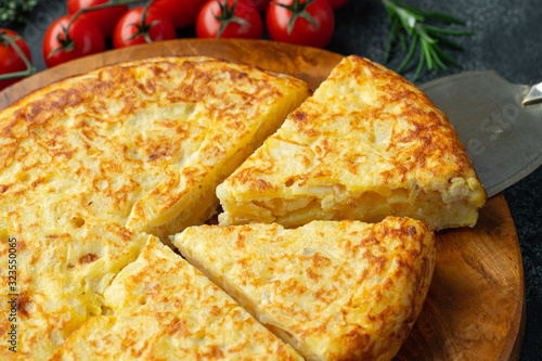 Spanish omelette with potatoes and onion, typical Spanish cuisine. Tortilla espanola photo