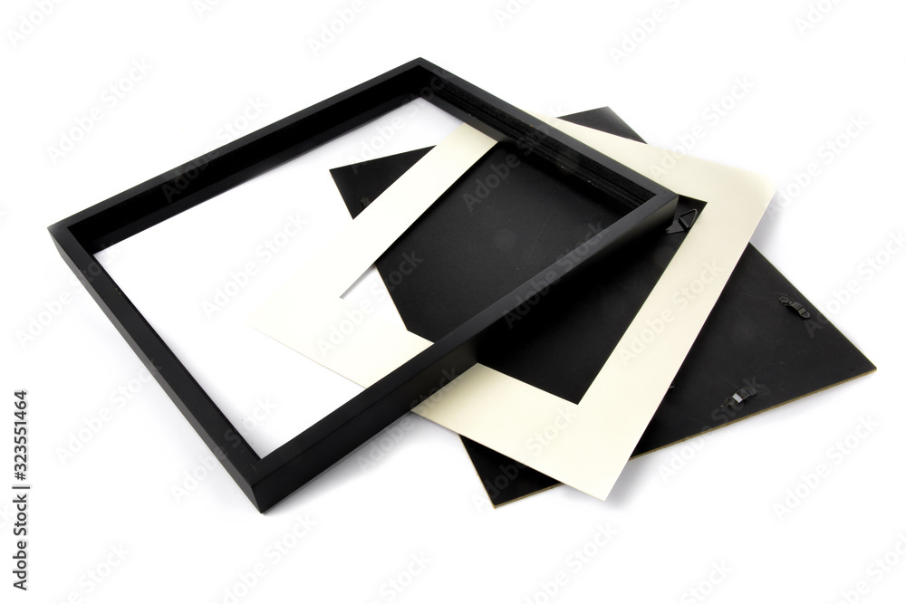 empty black wooden photo frames and mats isolated on white empty black wooden photo frames and mats isolated on white