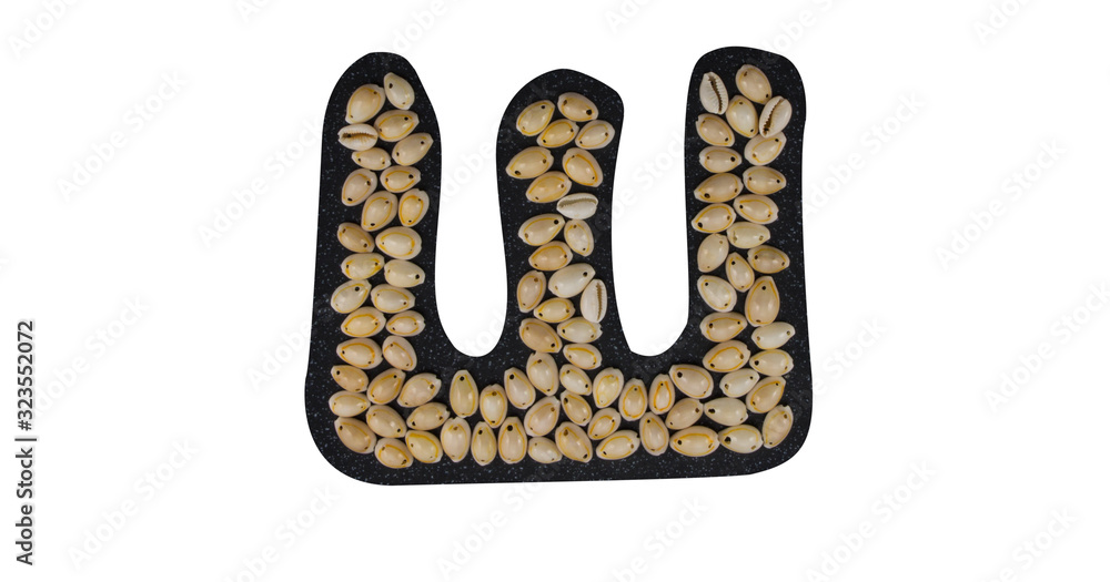 Isolated Font Russian Letter Ш made of seashell on black granite on ...