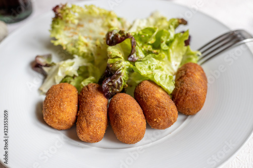 Delicious tasty, served chicken croquettes in a Spanish restaurant